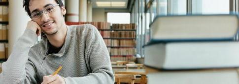 A student sitting in a library